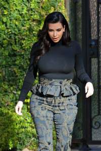 Kim Kardashian departs her home